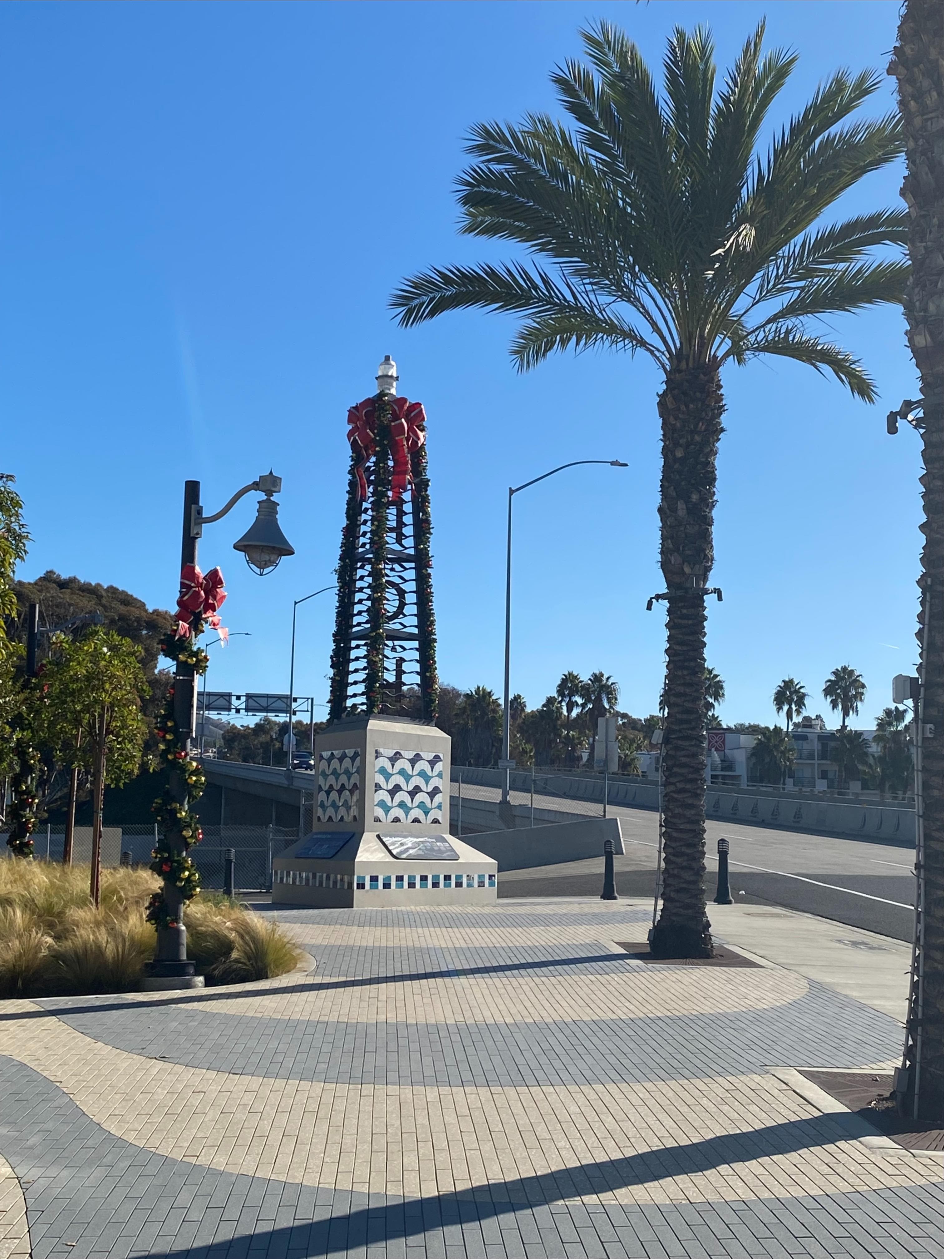 Outdoor Dana Point tile monument with elaborate blue geometric and wave pattern design